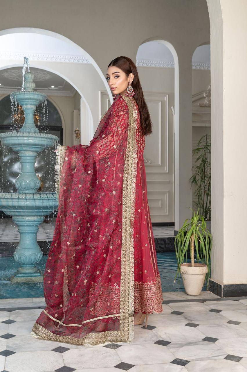 Back view of RANGREZA SAJNI - Pakistani Outfits | Pink Long Frock Set showcasing detailed embroidery and gold-trimmed organza dupatta in traditional attire.