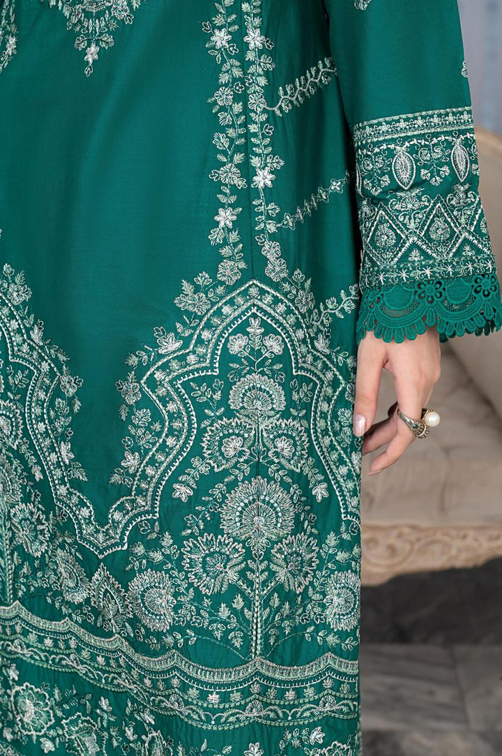 Zoomed-in embroidery on Rangreza Sajni green lawn shirt, featuring intricate floral and geometric patterns for a refined look.