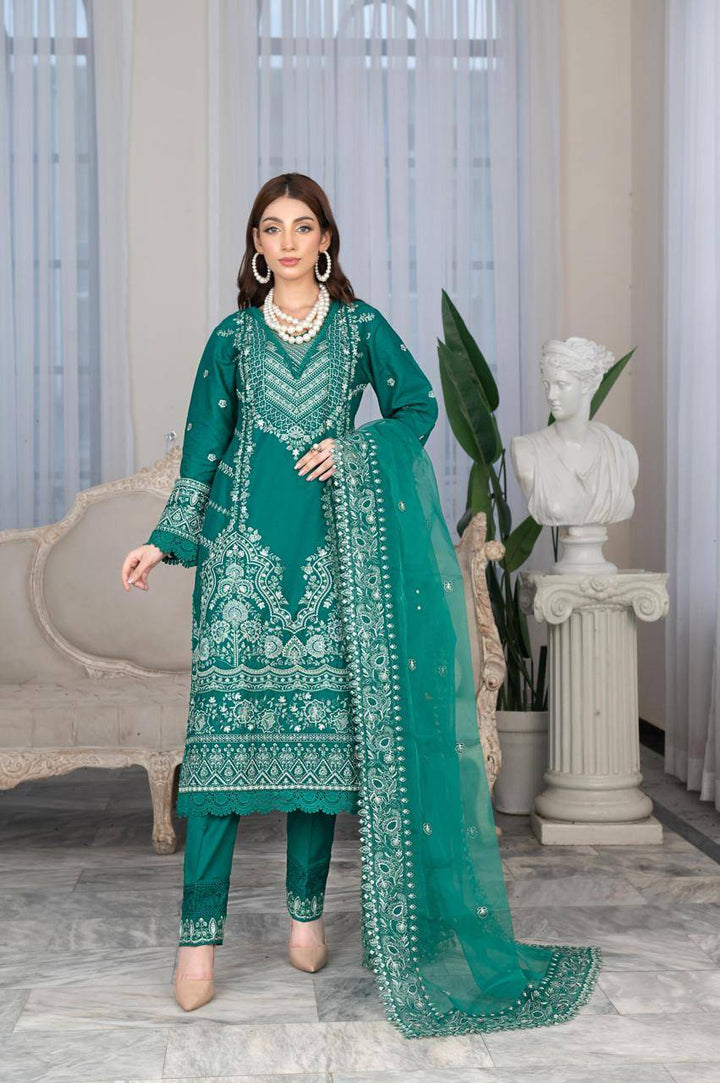 Rangreza Sajni green lawn shirt pants and dupatta set with intricate pink and blue embroidery, ideal for Pakistani outfits online.