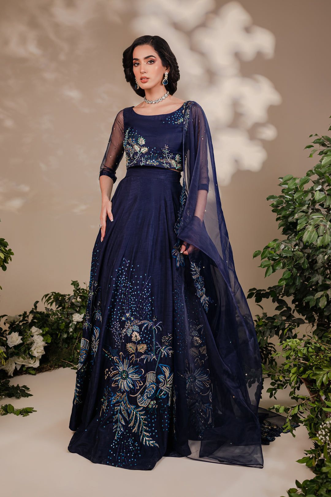 Batik Arden 3 Piece formal dress featuring navy blue organza choli with gold and light blue embroidery, paired with raw silk lehnga and dupatta.