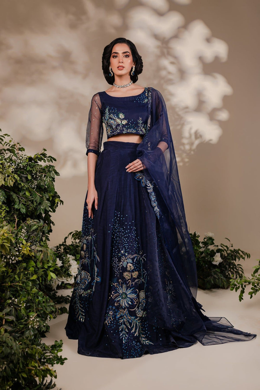 Front pose of Batik Arden 3 Piece formal wear with embroidered choli, flared lehnga, and sheer dupatta in elegant navy blue tones.