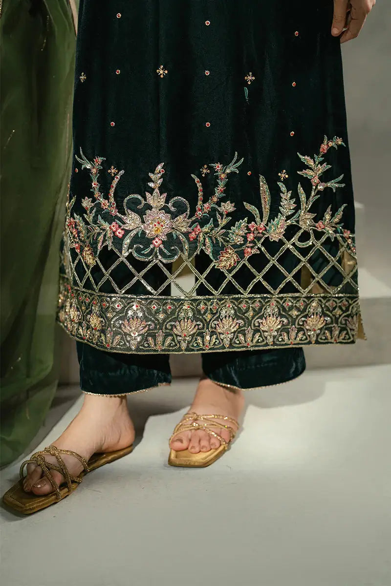 Bottom embroidery of MUSHQ Ayren green velvet shirt and trousers set, featuring floral patterns and intricate gold threadwork.