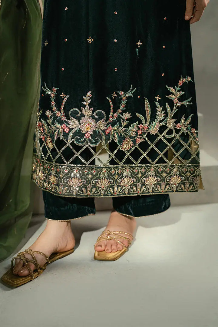 Bottom embroidery of MUSHQ Ayren green velvet shirt and trousers set, featuring floral patterns and intricate gold threadwork.
