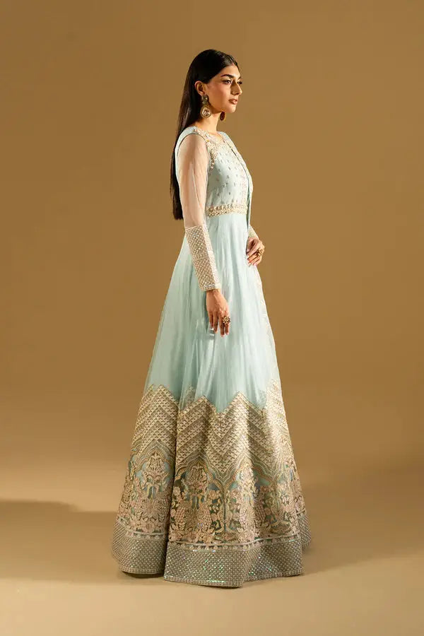 Side profile of MARYAM AND MARIA IZUMI embroidered Anarkali gown in soft blue, ideal for traditional and ceremonial clothing collections.