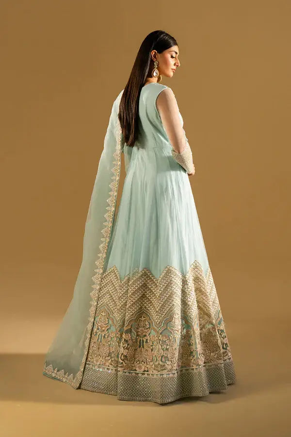 Back view of MARYAM AND MARIA IZUMI Anarkali suit featuring intricate embroidery and flowing silhouette in pastel blue for ceremonial wear.