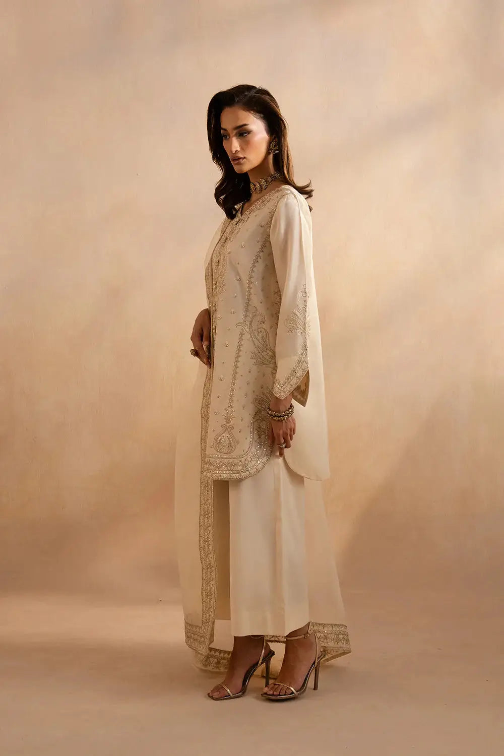 Side view of Maryum Alice Outfit - Mariam's Collection showcasing detailed embroidery on sleeves and dupatta in beige organza fabric.