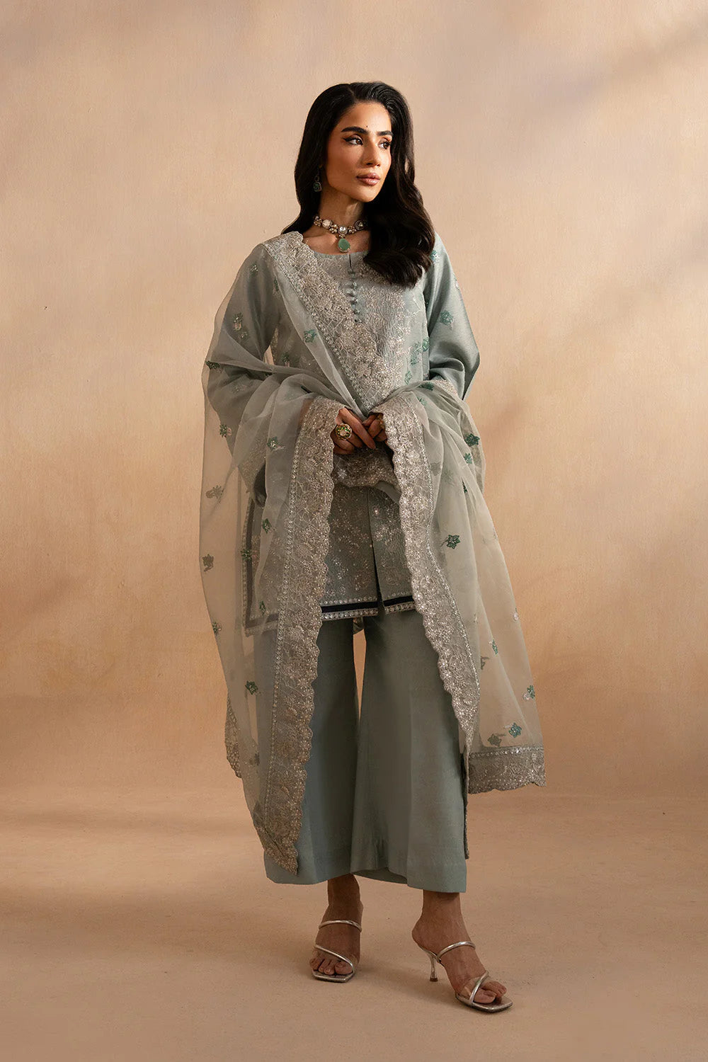 Back view of Maryum N Maria Evelyn 3-piece silk outfit highlighting embroidered shirt and dupatta with lace detailing.