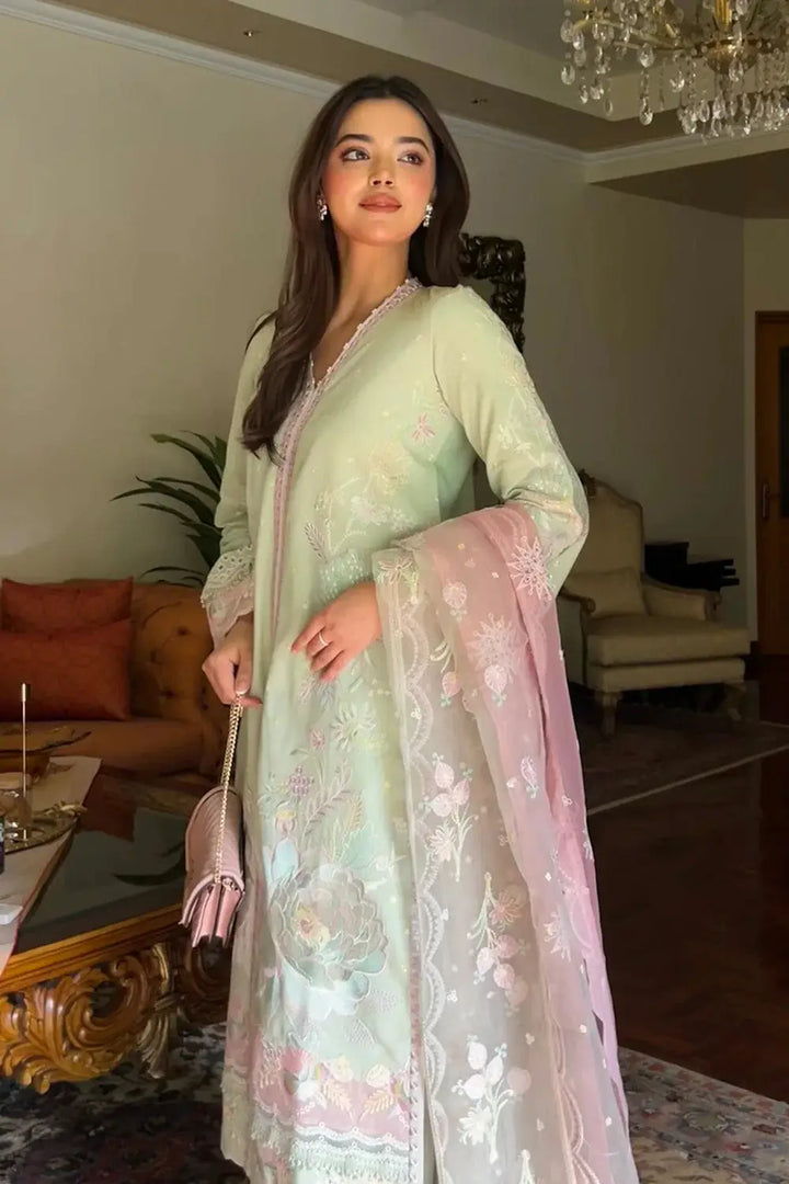 Elegant Elara 25 3-piece suit by Maryum N Maria featuring floral embroidery on mint fabric and a pastel pink printed dupatta.