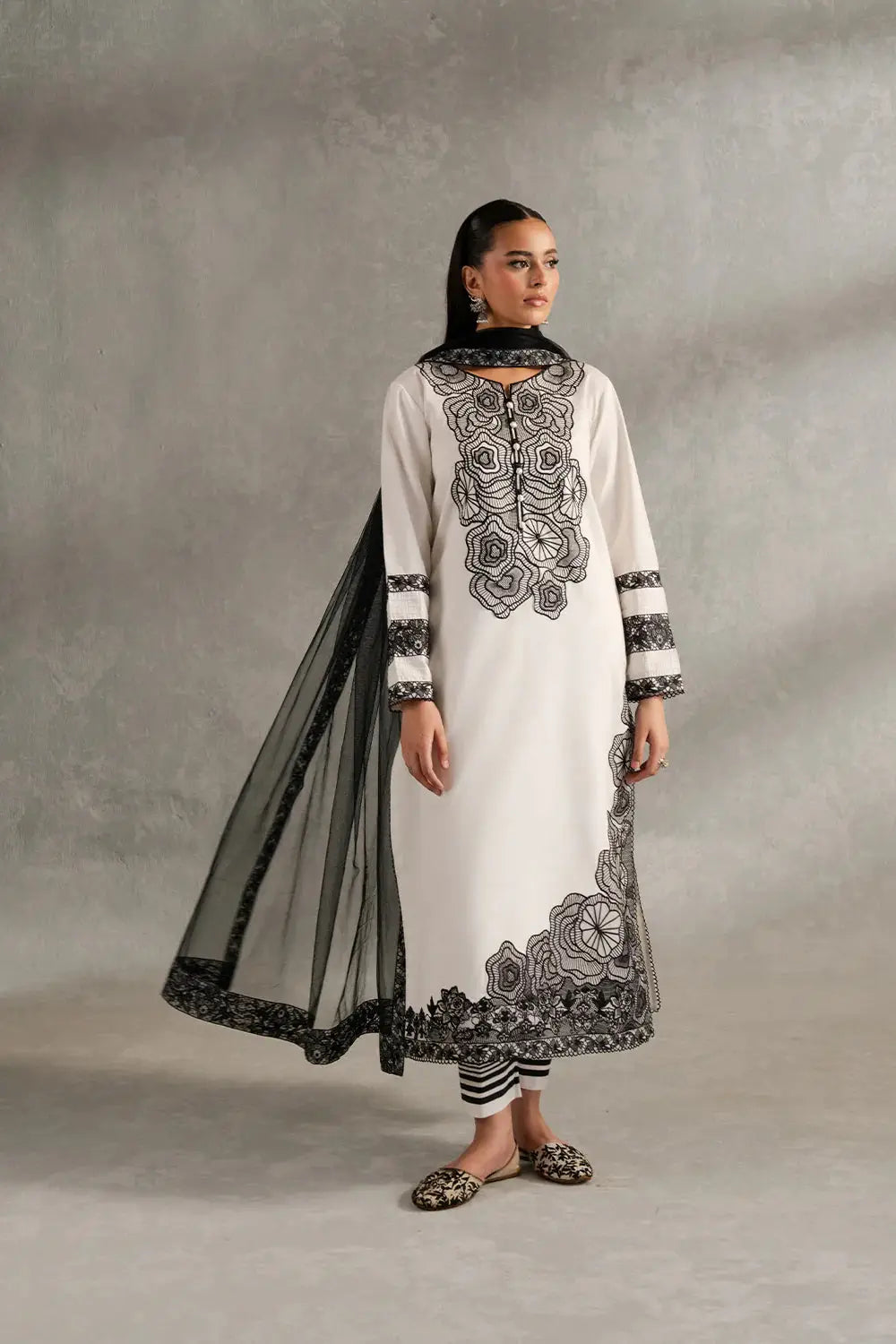 SIENNA - MS50417 Pakistani Dupatta Suit Ensemble featuring a white lawn shirt with black embroidery, net dupatta, and cambric trousers.