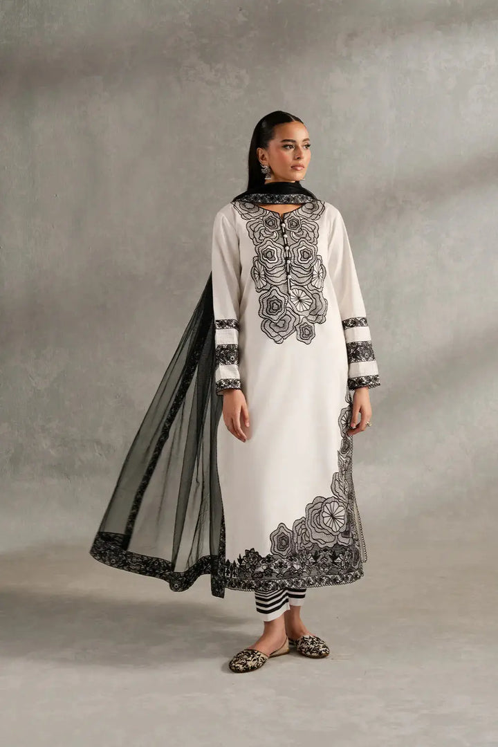SIENNA - MS50417 Pakistani Dupatta Suit Ensemble featuring a white lawn shirt with black embroidery, net dupatta, and cambric trousers.