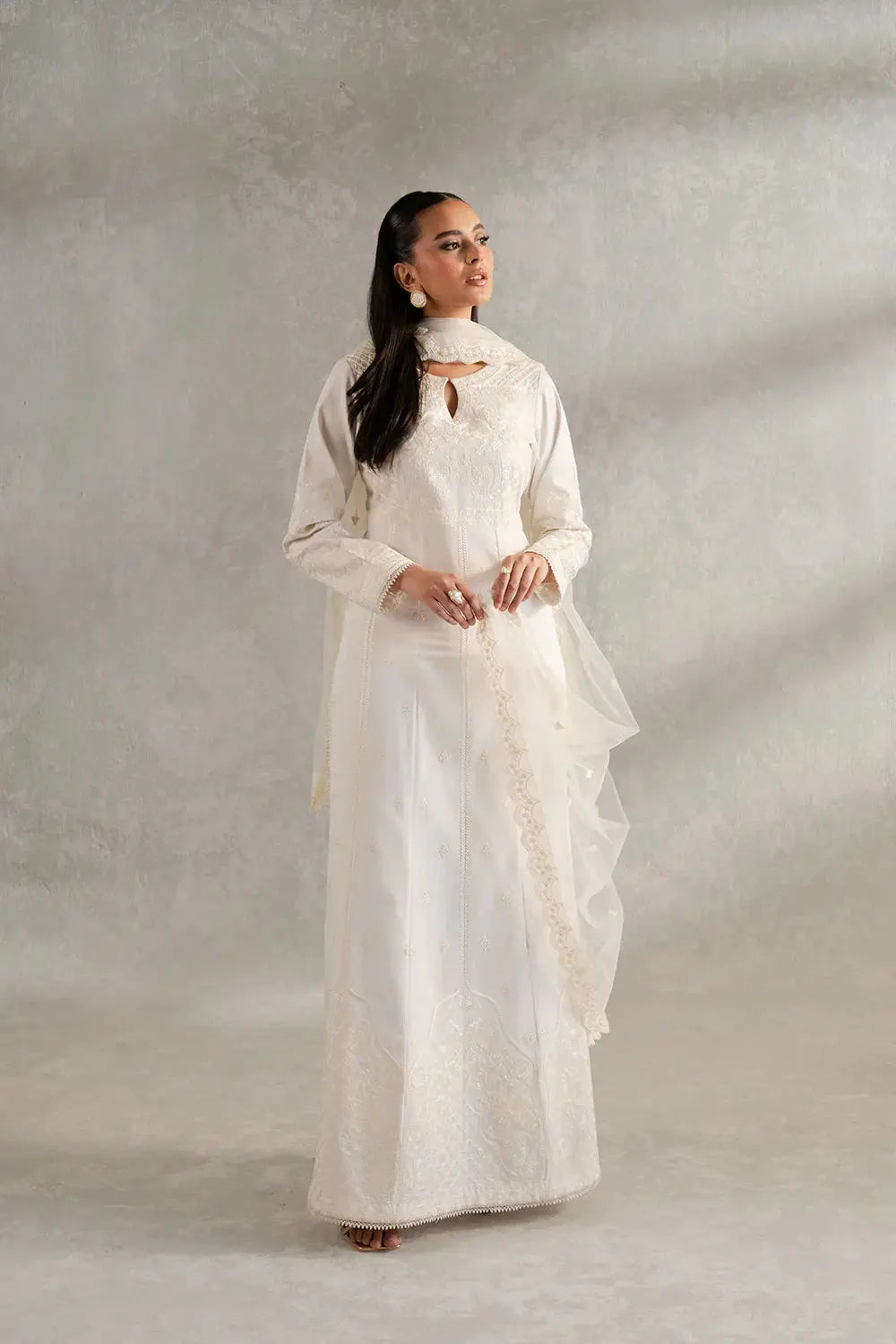 ESME MS50418 Pakistani Women's Three PC features a white embroidered lawn shirt, cambric trousers, and net dupatta for elegant formal wear.