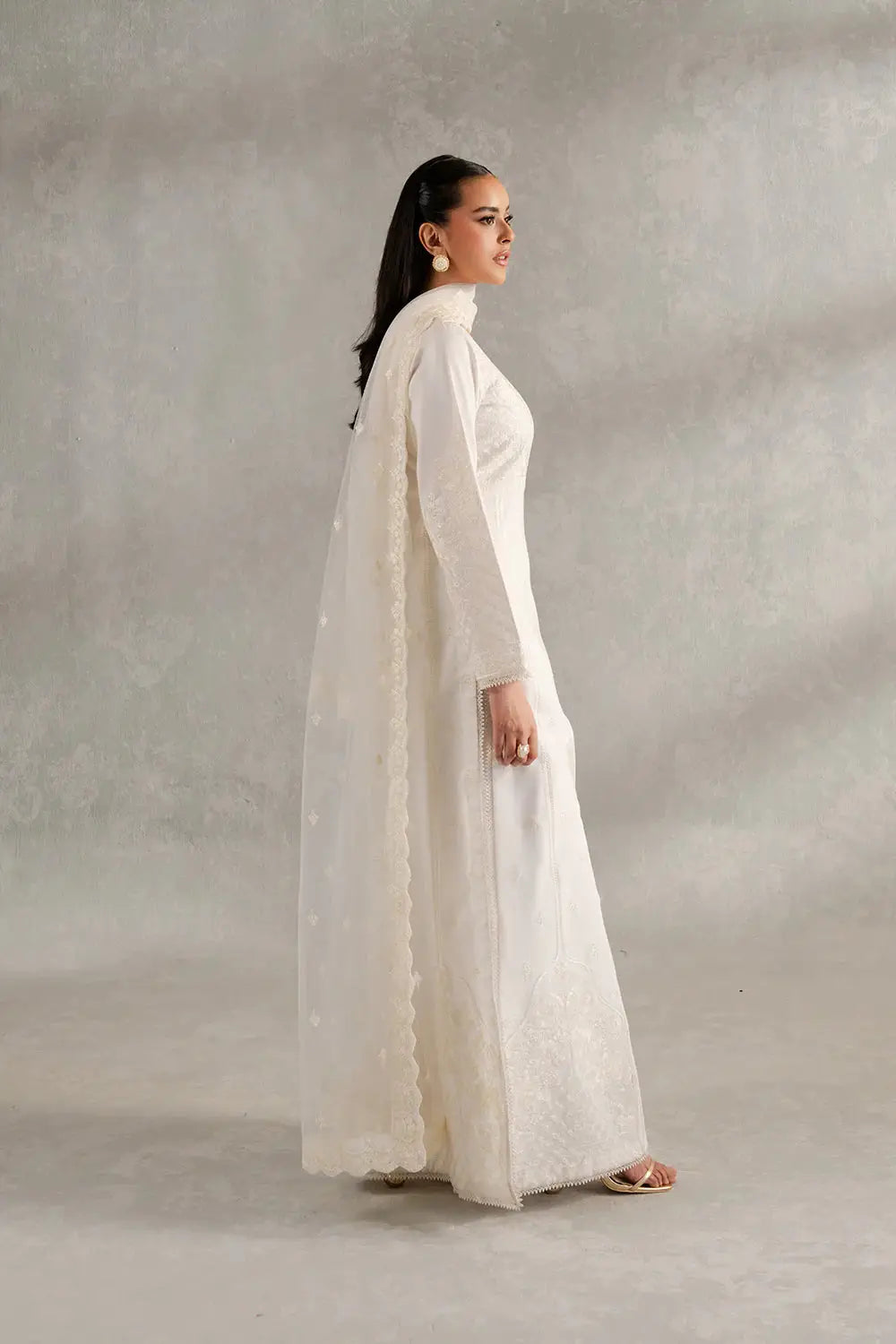 Side view of ESME MS50418 3 Piece Pret showcasing delicate embroidery on the shirt and scalloped net dupatta in a graceful silhouette.