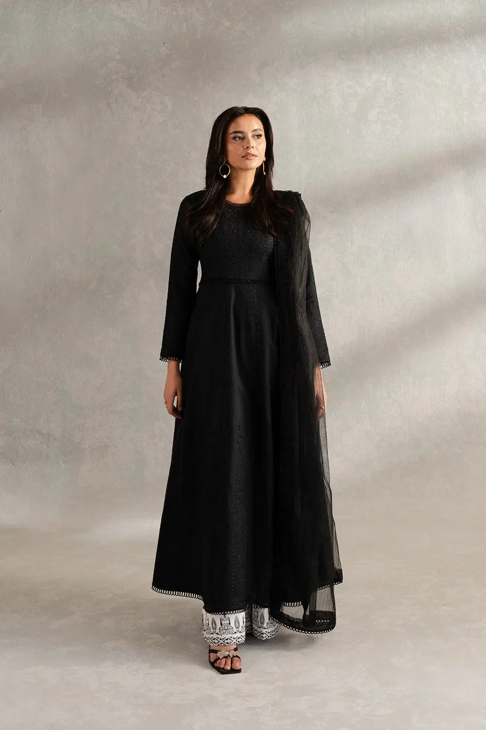 Maryum N Maria Lawn Isla-B MS50419 black Pakistani outfit with embroidered shirt, white trousers, and matching dupatta for festive wear.