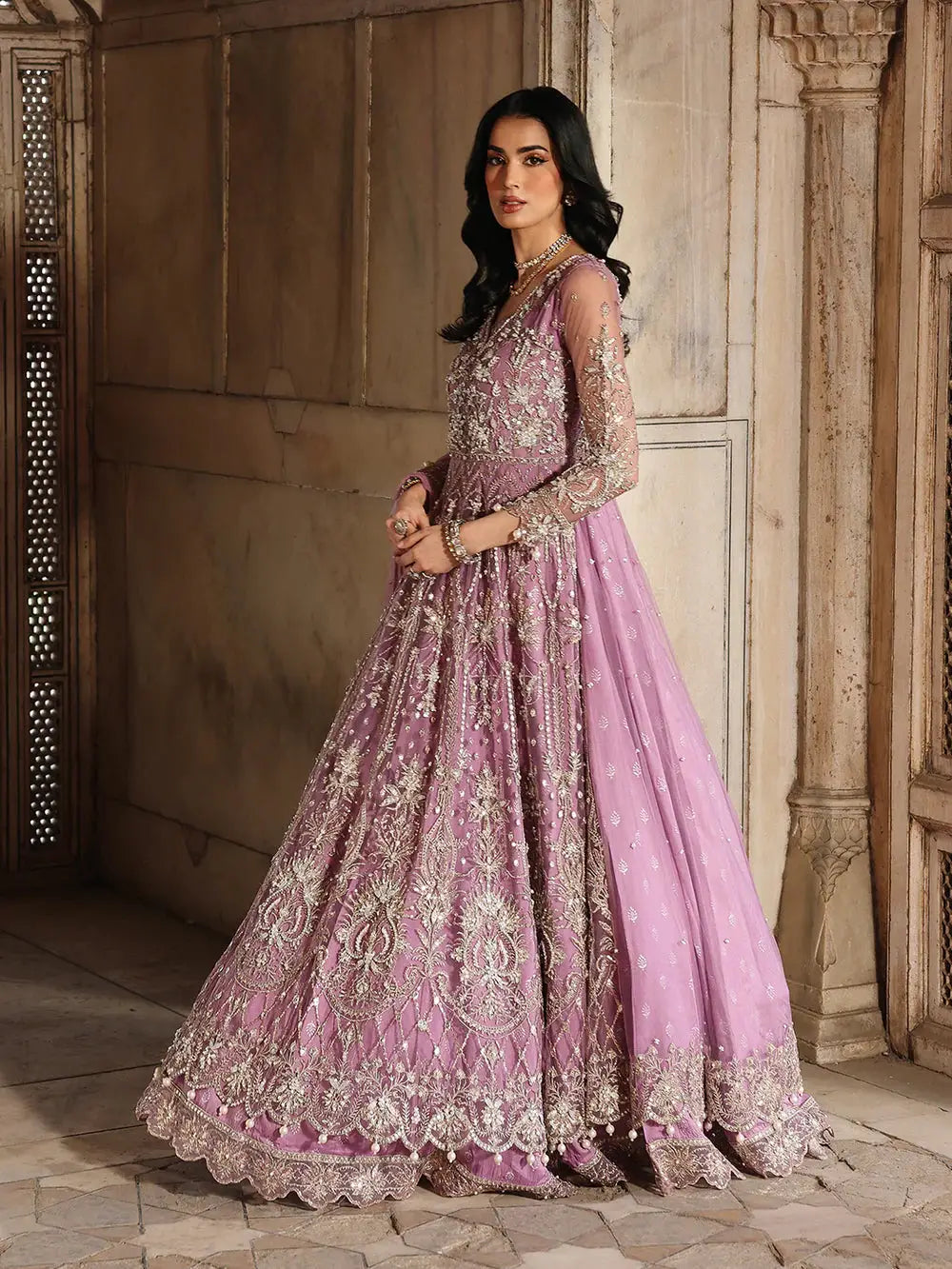 Pink heavily embroidered gown with dupatta and jewelry