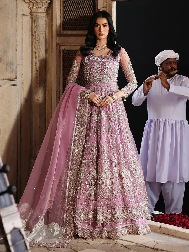 Pink embroidered bridal dress with net dupatta and jewelry