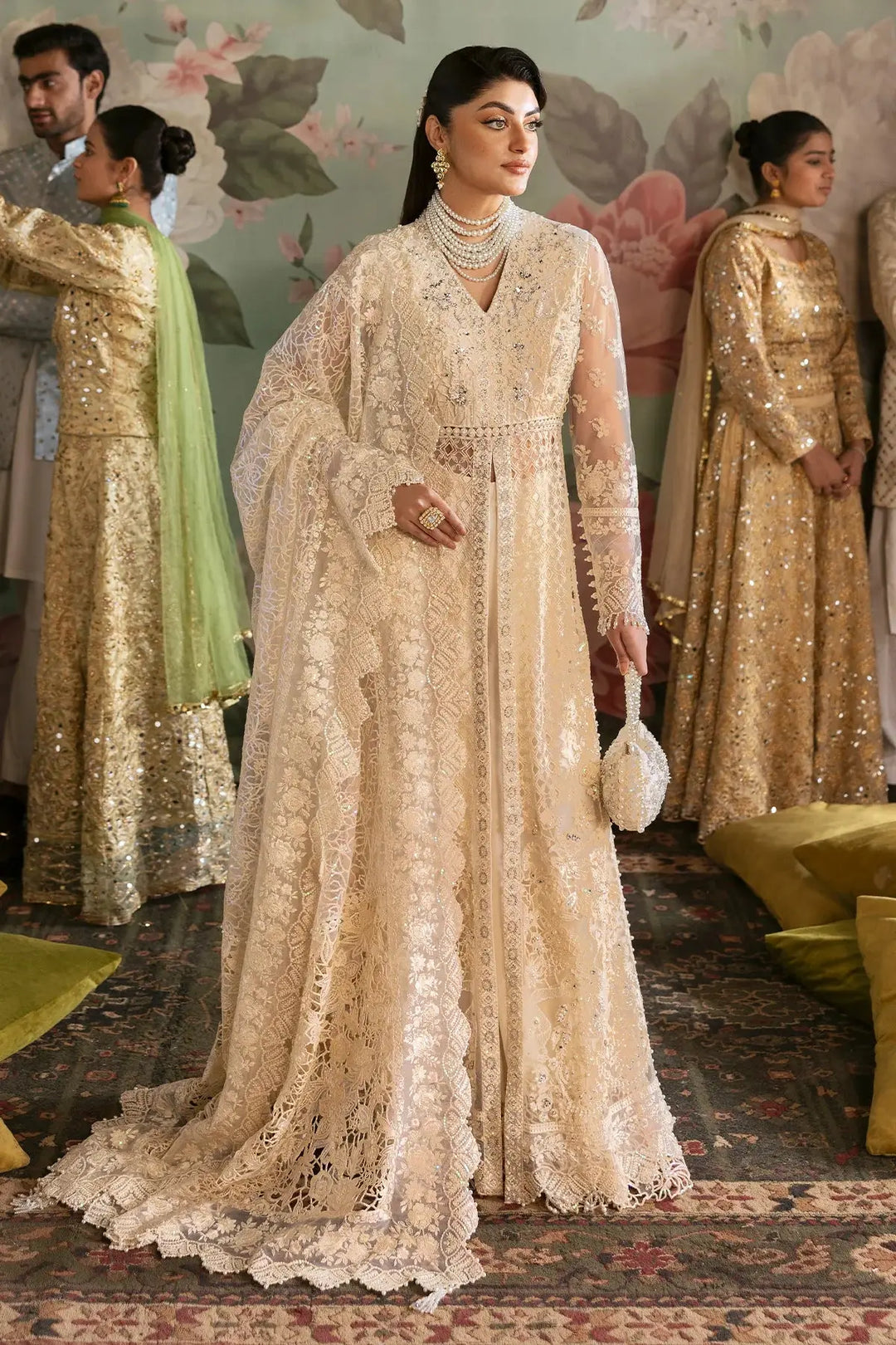 Full front view of embroidered Pakistani wedding formal dress with net shirt, organza dupatta, and raw-silk pants, ideal for bridal occasions.