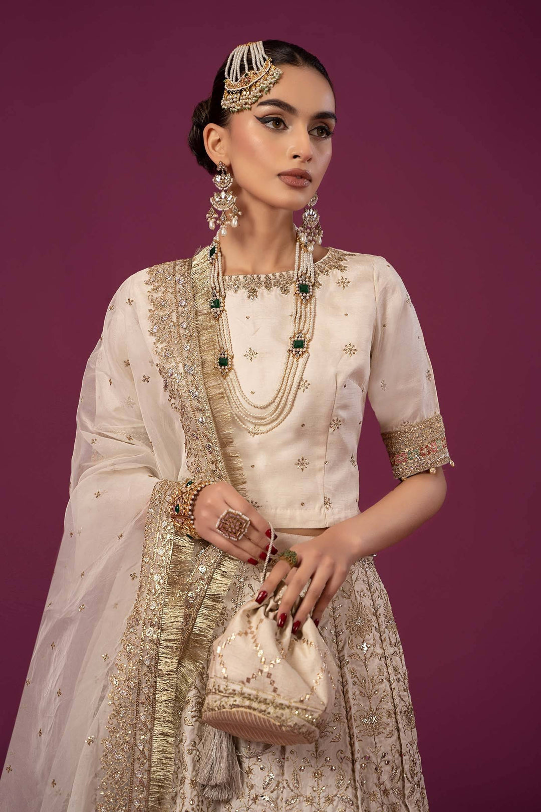 Close-up of Maria B formal wear with accessories