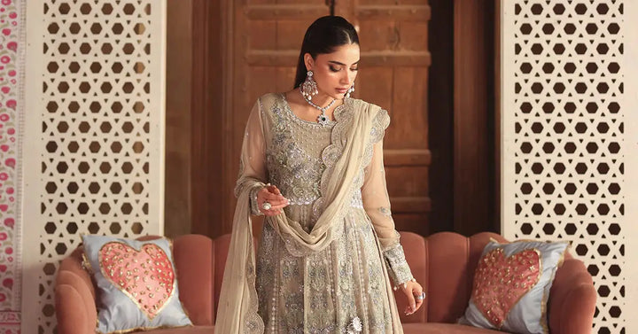 Model in Embroidered Net Suit for Asian Wedding Wear with luxurious 3D floral embroidery and soft net dupatta, styled for elegance.