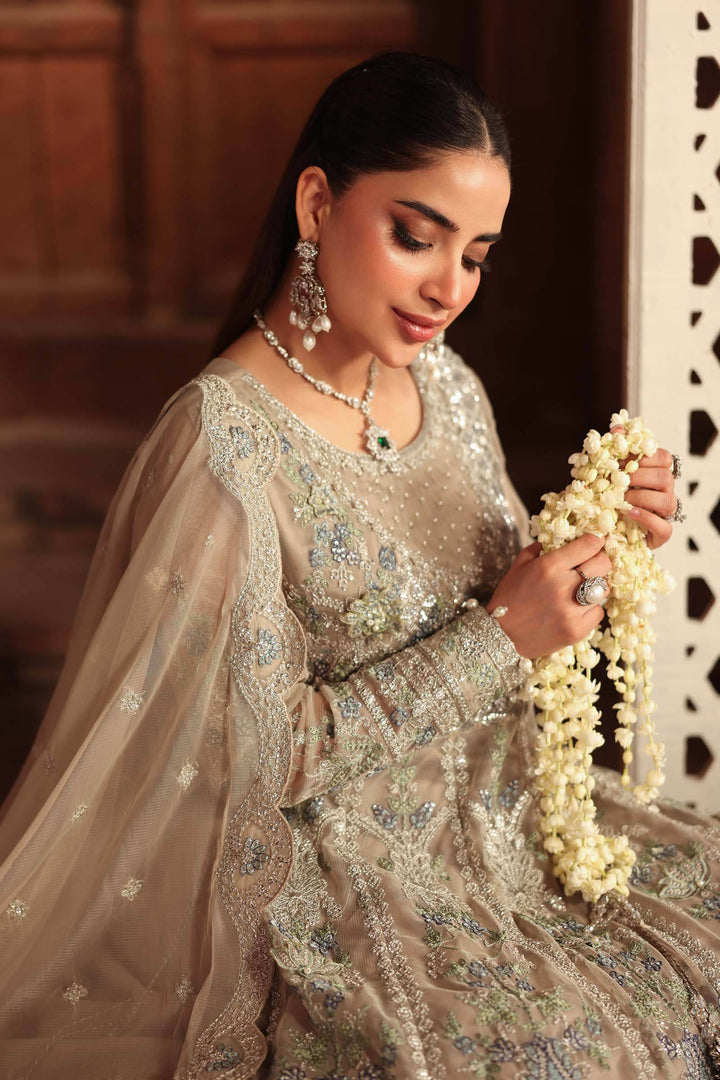 Close-up of Embroidered Net Suit highlighting intricate handwork and shimmering embellishments, perfect for Asian bridal wear.