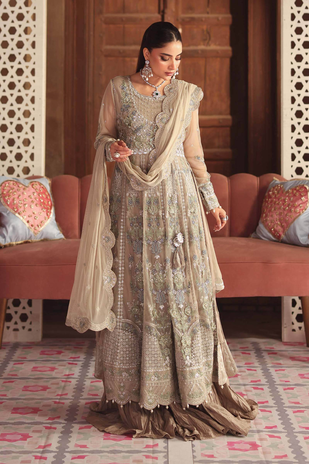 Front view of Elegant Embroidered Net Suit with 3D floral accents and scalloped dupatta, ideal for weddings and festive celebrations.