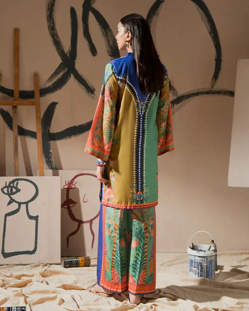 Back view of 2 Piece Outfit EA-21 in printed raw silk with intricate detailing and colorful patterns, perfect for semi-formal or artistic occasions.