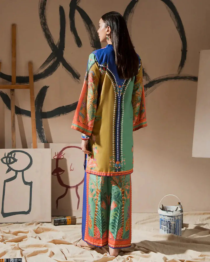 Back view of 2 Piece Outfit EA-21 in printed raw silk with intricate detailing and colorful patterns, perfect for semi-formal or artistic occasions.