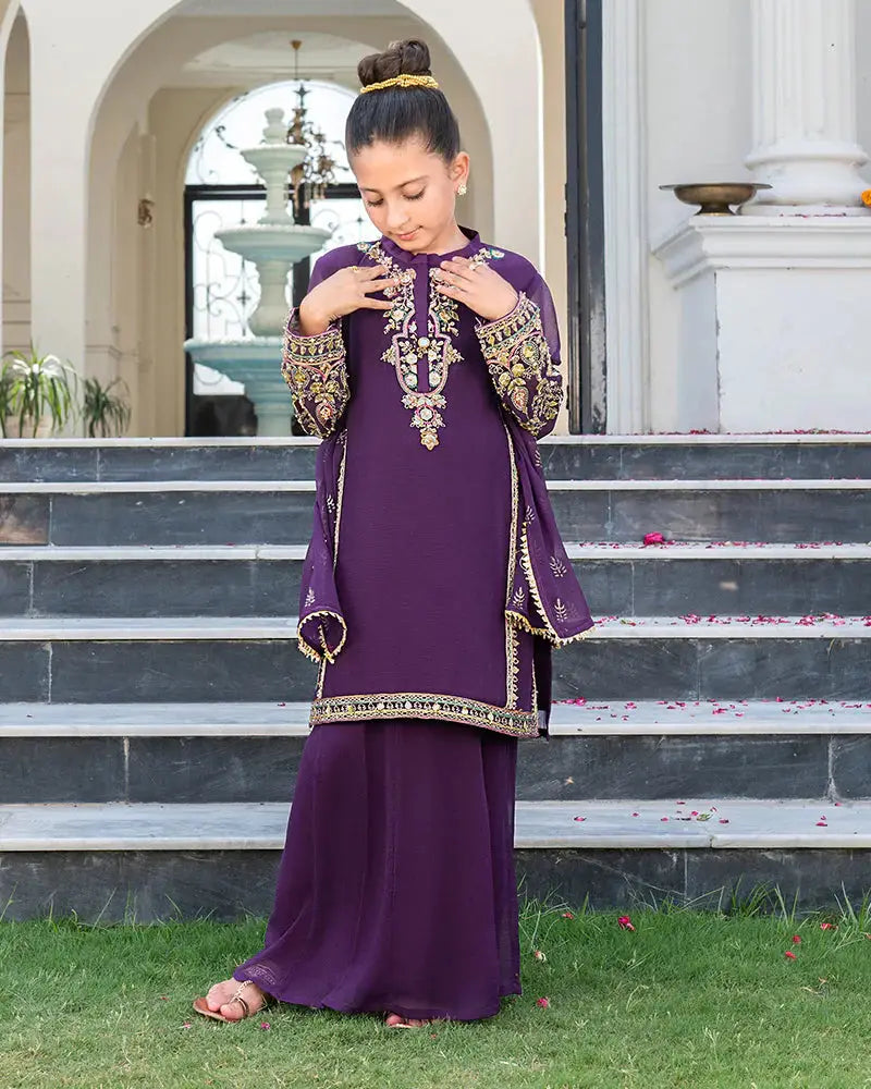 Young girl modeling Purple Kids 3 Piece - Girls Dress Shop outfit with chiffon shararah and embellished shirt, perfect for ceremonial clothing.