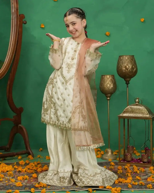 Rangreza White Girl Gharara with raw silk shirt, crystal sequins, and embroidered gharara. Paired with a khadi net dupatta for an elegant look.