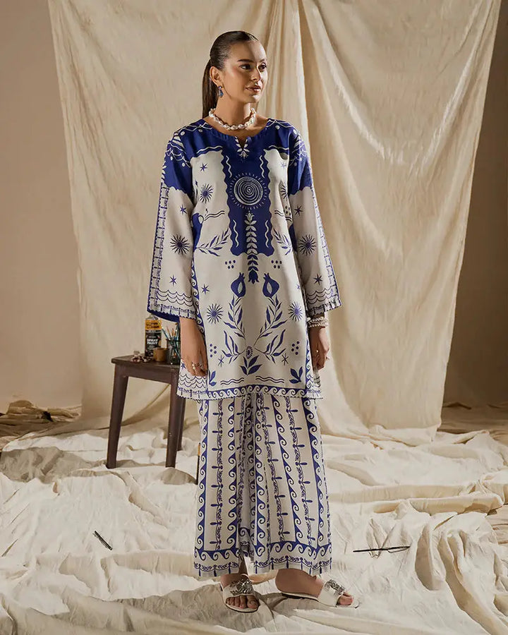 Front-facing view of the EA-17 2 Piece Outfit in raw silk with bold blue prints, a stylish co-ord set for modern apparel collections.
