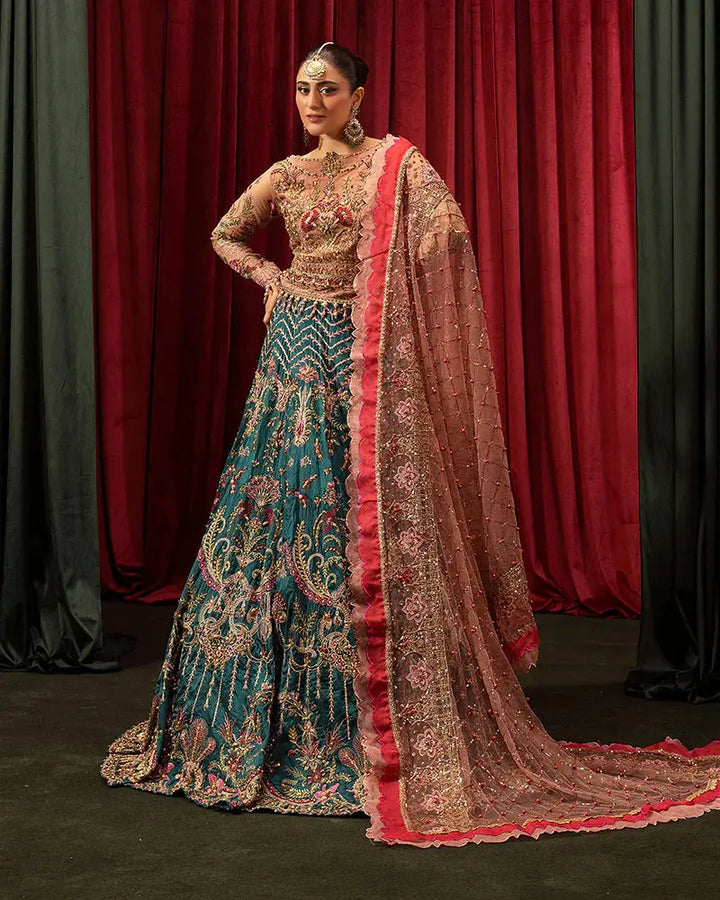 AROOSH FAANA AR-97-3500 lehenga set featuring intricate embroidery on teal skirt with gold and pink dupatta. Ideal for weddings and festive events.