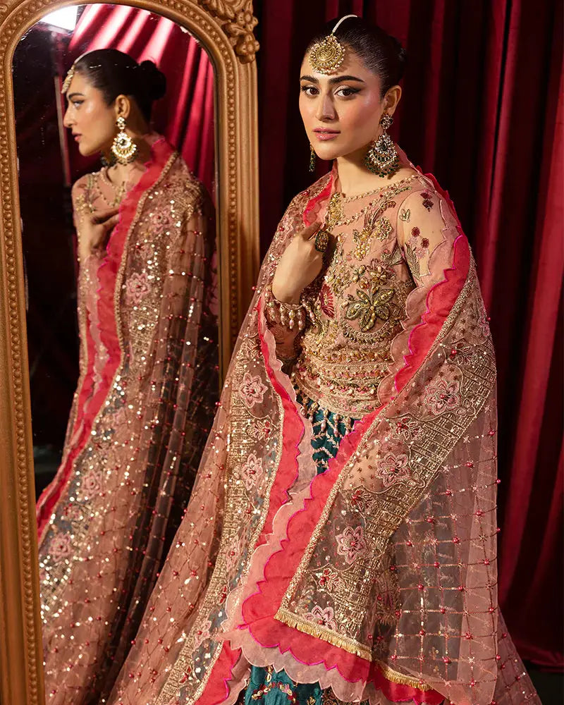 Close-up of AROOSH FAANA Pakistani lehenga set with detailed floral embroidery and sheer dupatta, perfect for luxury wedding attire.