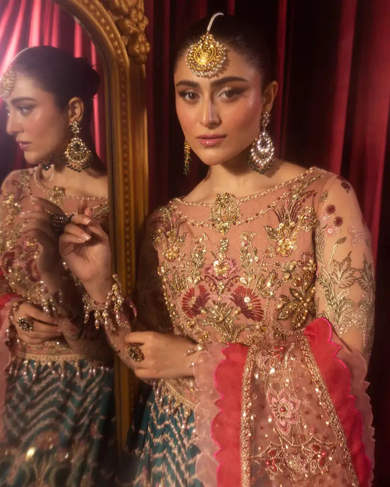 Detailed view of AROOSH FAANA lehenga blouse and dupatta with gold embellishments, ideal for Pakistani wedding and event wear.