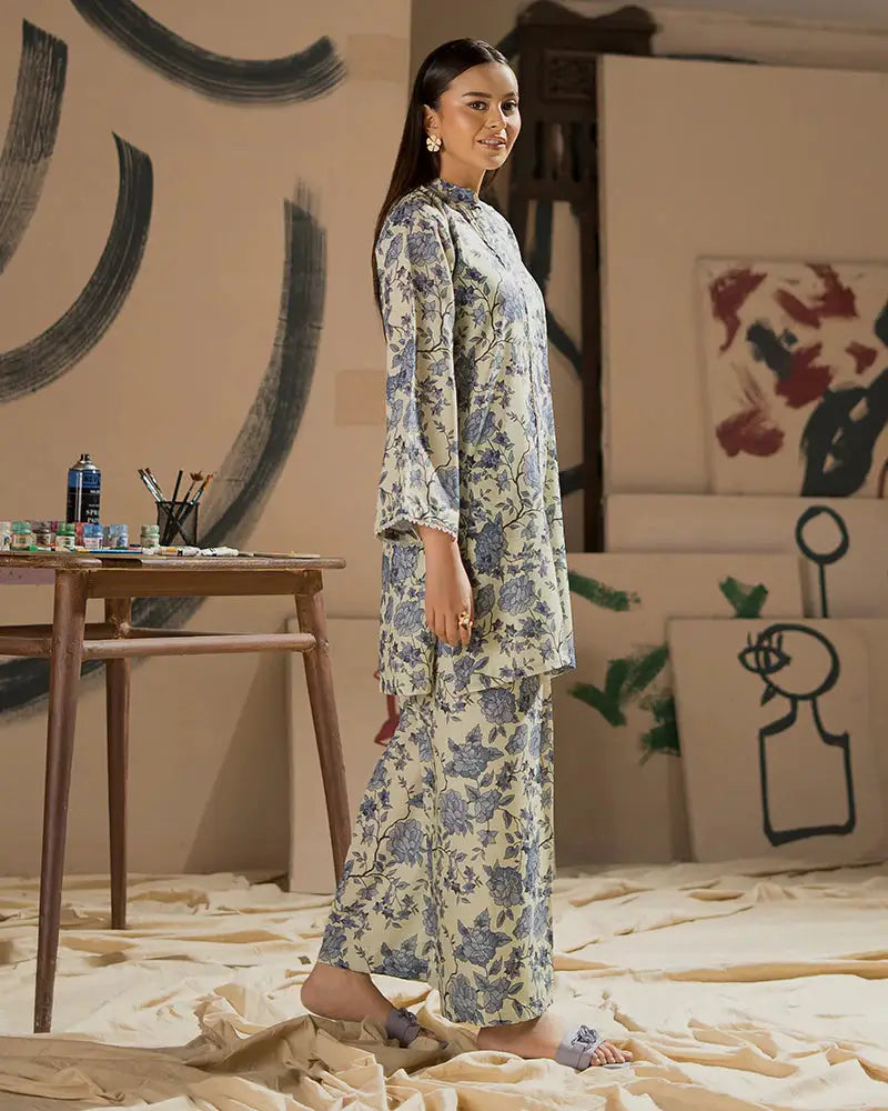 Model in floral printed raw silk 2 piece dress set with relaxed fit, styled for a contemporary casual vibe.
