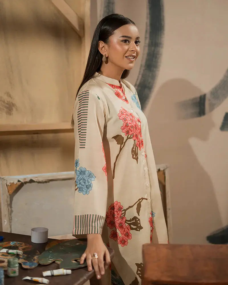 Close-up of Printed Raw Silk Co-ord Set | 2 Piece Outfit highlighting floral design and striped sleeve detail. Elegant Pakistani outfit for semi-formal events.