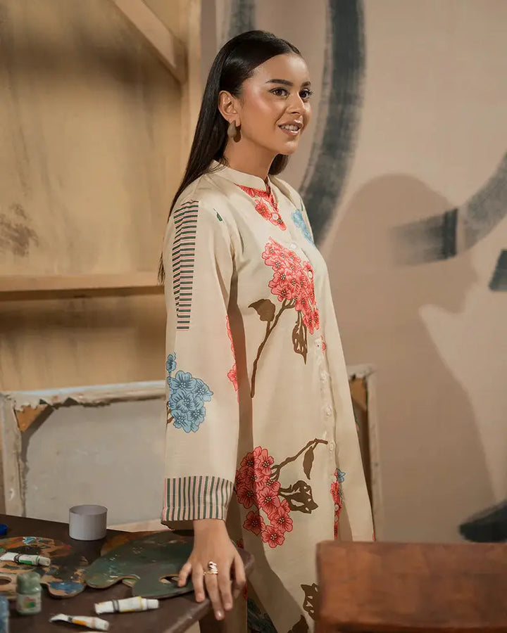 Close-up of Printed Raw Silk Co-ord Set | 2 Piece Outfit highlighting floral design and striped sleeve detail. Elegant Pakistani outfit for semi-formal events.