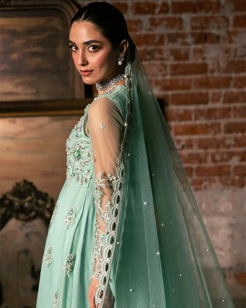 Elegant Rangreza JANNAT AL-4270 shirt, bottom, and dupatta set with hand-embroidered sequins and lace detailing in a soft mint green hue.