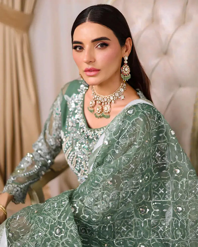 AROOSH Organza Maxi - Pakistani Asian Clothes | Embellished Dress close-up showing pearl, sequin, and seashell embroidery on bodice.