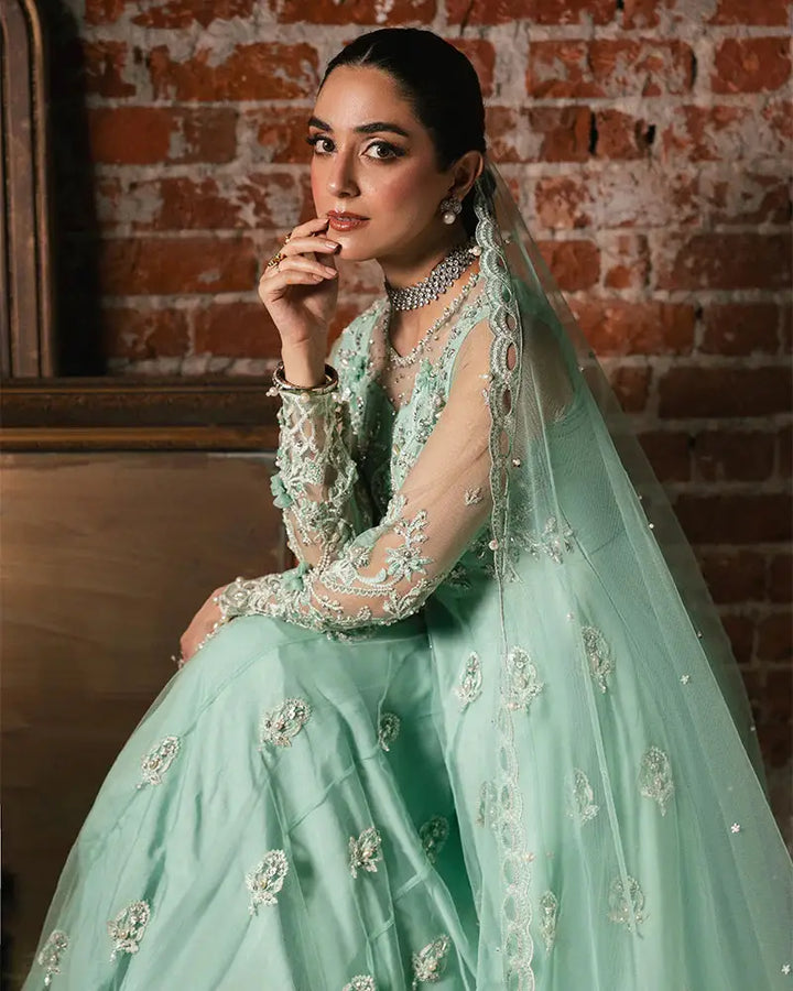 Close-up of Rangreza JANNAT AL-4270 dress highlighting delicate embroidery, sheer sleeves, and luxury net dupatta with lace border.