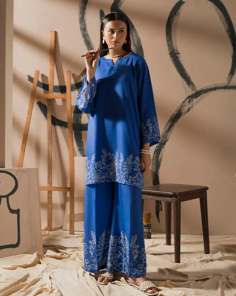 EA-23 2 Piece Outfit featuring a printed raw silk shirt and bottom set in vibrant blue, ideal for modern Pakistani fashion lovers.