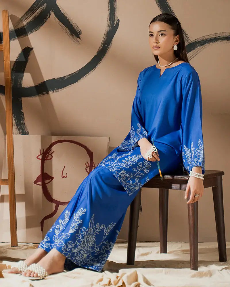 Stylish Pakistani Co-ord Set EA-23 in blue silk with intricate white floral prints, combining tradition and chic comfort in apparel.