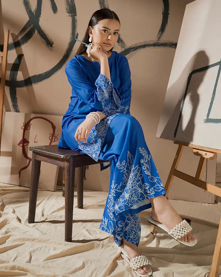 Elegant 2 Piece Outfit EA-23 in printed raw silk, showcasing a relaxed fit and artistic floral design for contemporary ethnic wear.