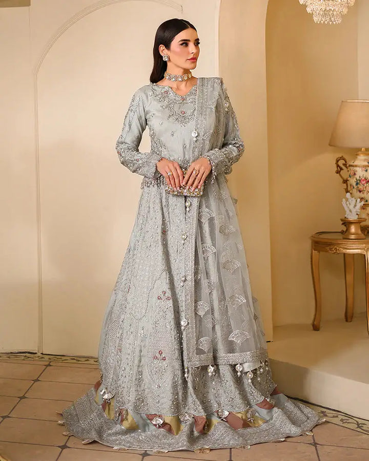 AROOSH WEDDING WEAR-bridal clothes Pakistani Raw Silk Choli with silver embroidery, sequins, and tassels. Includes matching dupatta and lehnga.