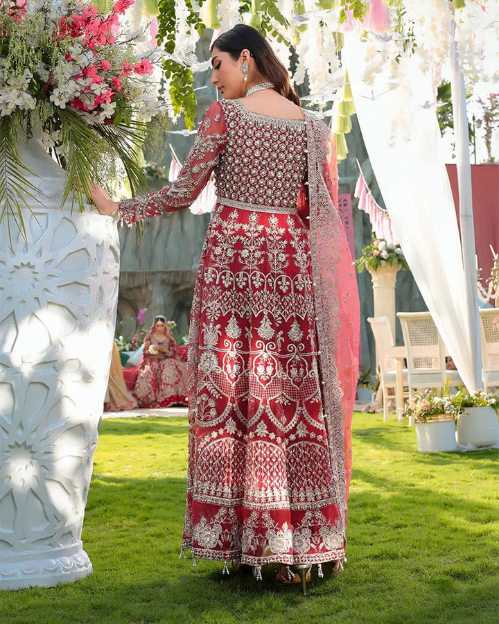 Back view of AROOSH Wedding Wear AR-148-1800 showcasing intricate embroidery on red organza maxi with net dupatta, ideal for Pakistani weddings.