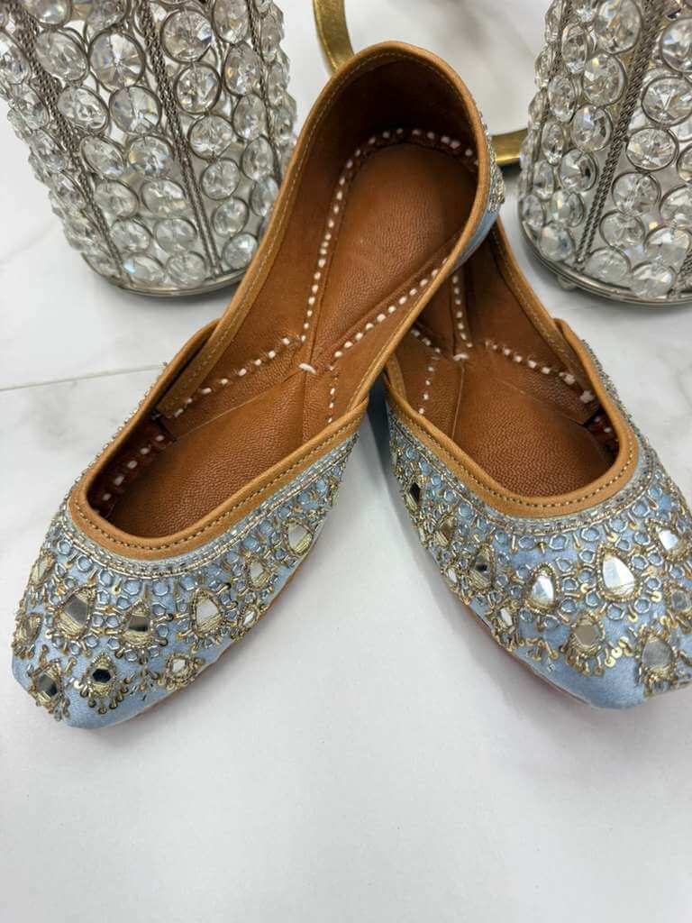 Manika Ice Blue Jutti - Blue Khussa with intricate pearl beadwork and mirror embellishments, perfect for elegant ethnic wear.