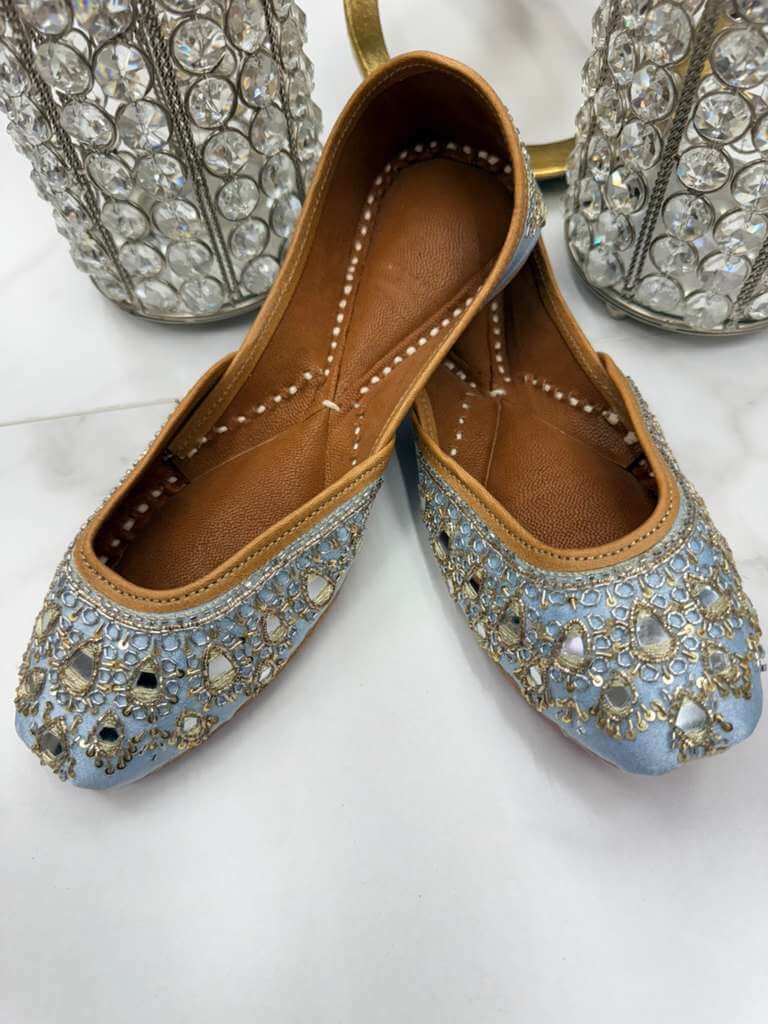 Manika Ice Blue Jutti - Blue Khussa designed with ornate mirror work and soft leather lining, combining traditional style with comfort.