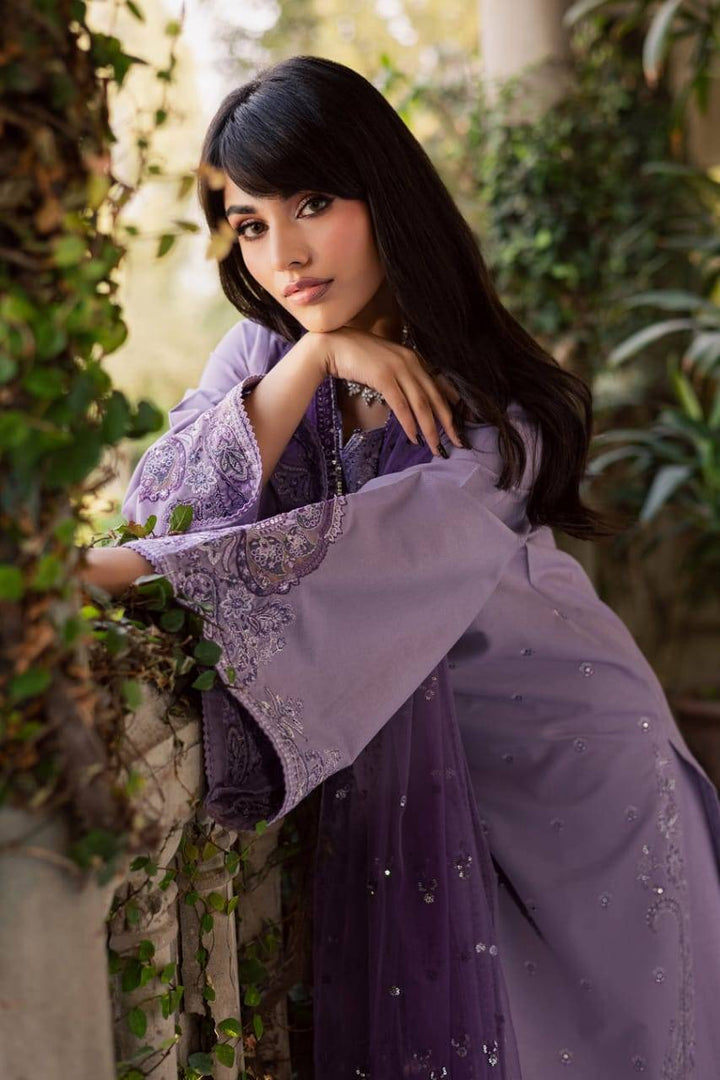 Close-up of BATIK Lilac Hiba 3Pc dress showing delicate embroidery on khaddar fabric and flared sleeves, perfect for festive wear.