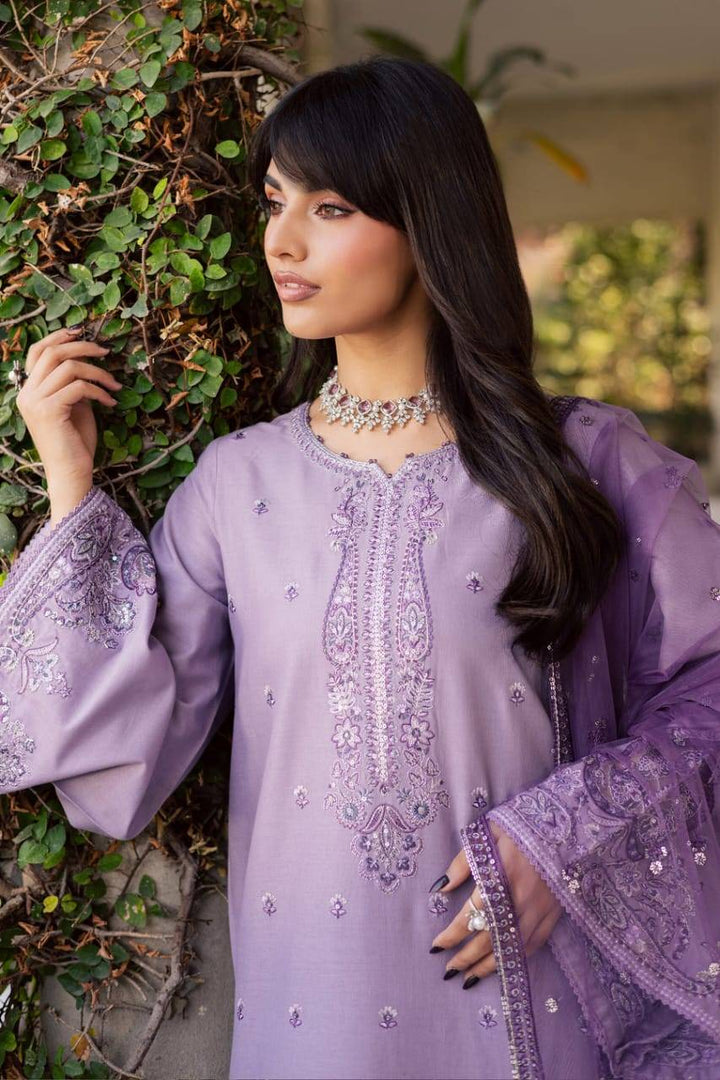 Detailed view of BATIK Lilac Hiba 3Pc party wear dress highlighting neckline embroidery and sleeve embellishments on lilac khaddar.