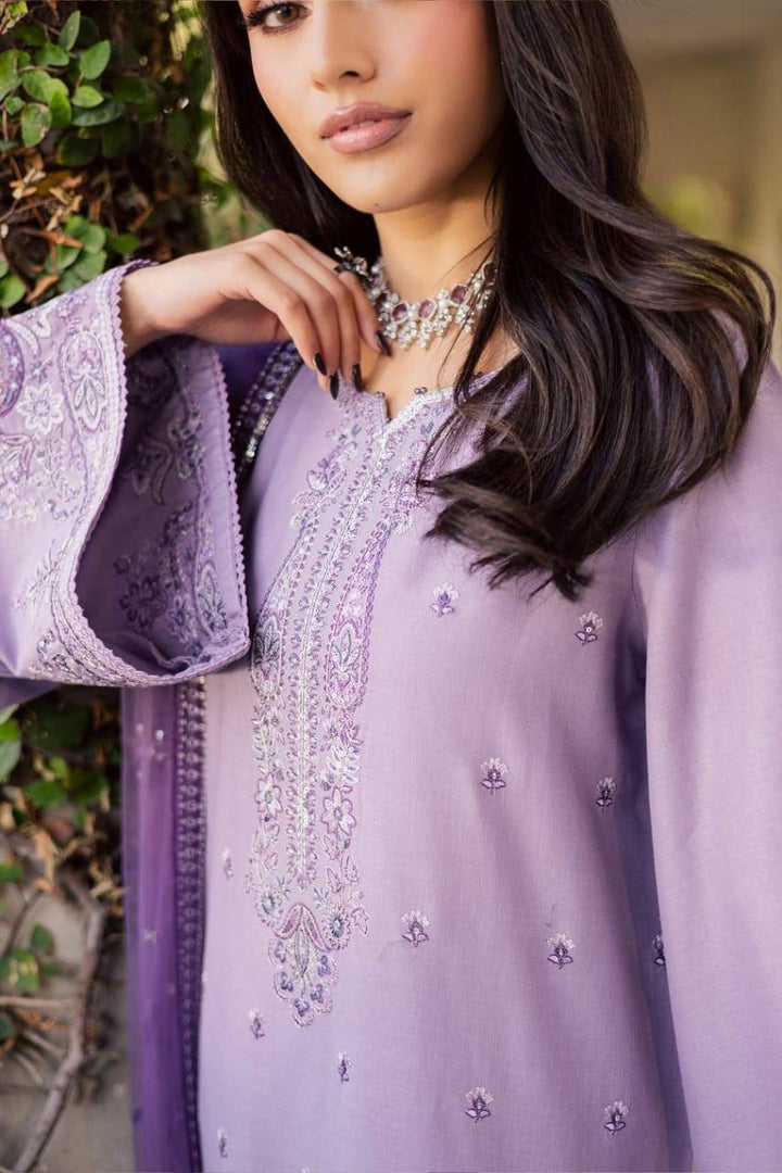 Zoomed-in embroidery on BATIK Lilac Hiba 3Pc khaddar dress showcasing fine threadwork and elegant lilac fabric for festive occasions.