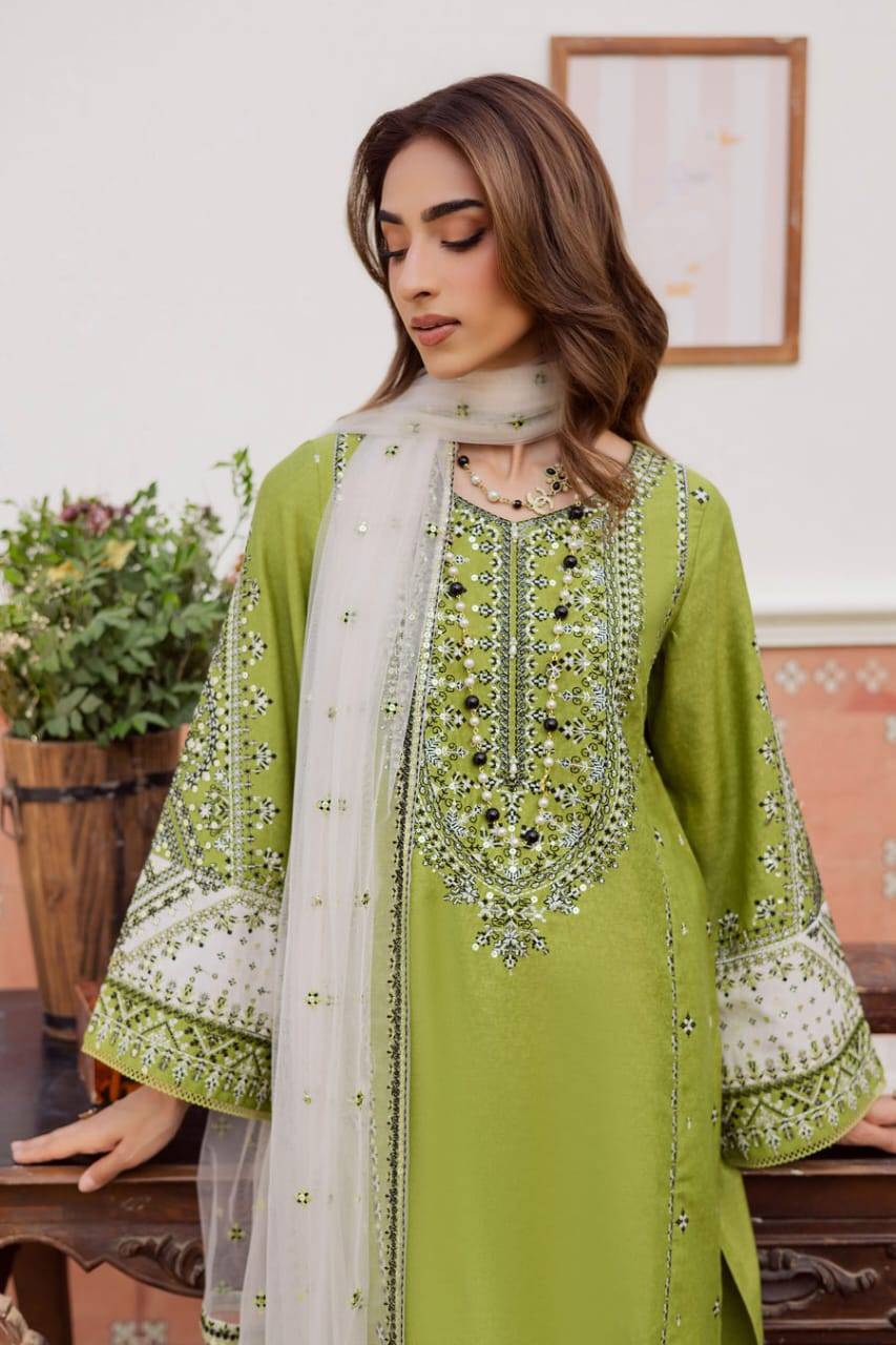 Elegant BATIK Nashville 3Pc green karandi dress with intricate embroidery and white dupatta, perfect for Eid and winter events.