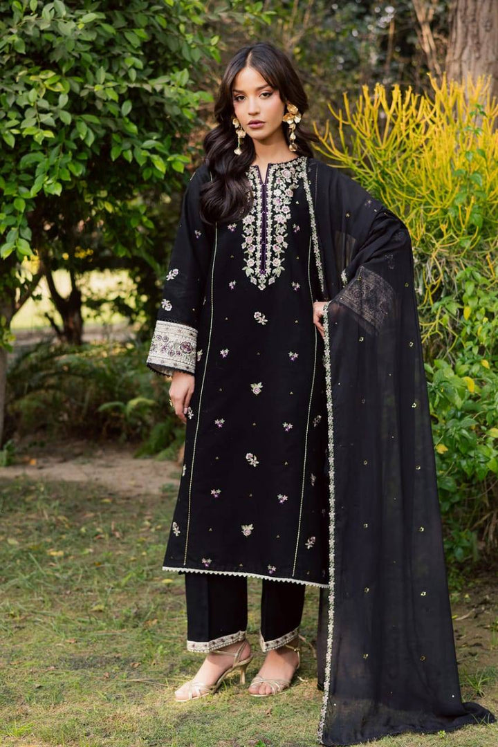 BATIK Night Bloom 3Pc embroidered khaddar dress in black with floral motifs, featuring wide sleeves and sequined dupatta for Pakistani women.